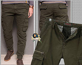 Джинси чоловічі зимові карго з кишенями зелені хакі на гумці 40-й розмір