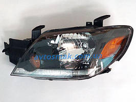 Фара передня Mitsubishi Outlander '03-05 ліва (FPS) механічна