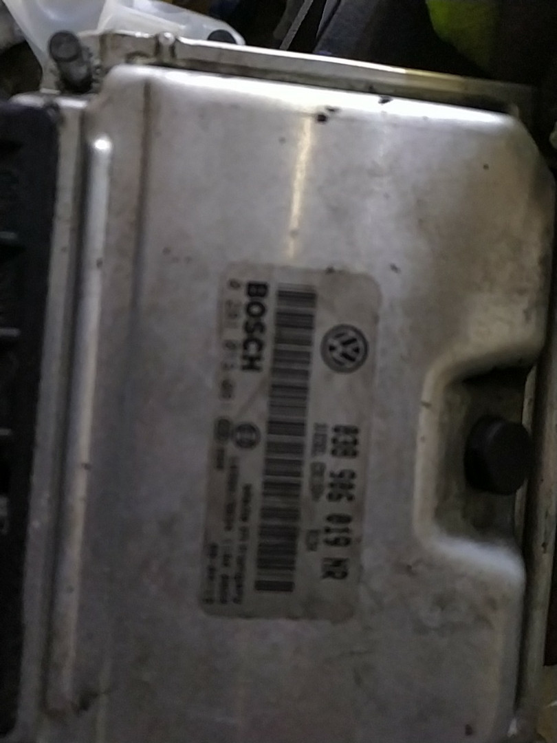 Блок керування двигуном 1.9 bsw skoda fabia/ roomster 07/11