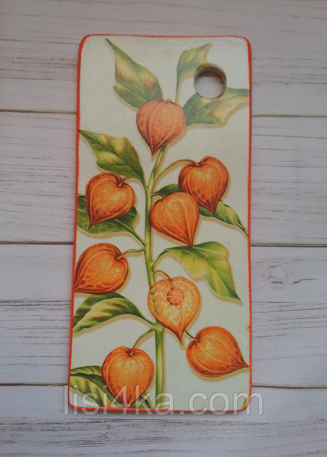 Дерев'яна обробна дошка для кухні в помаранчевих тонах з рослинним малюнком