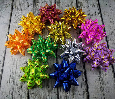 Бантики, квіточки для пакування подарунків
