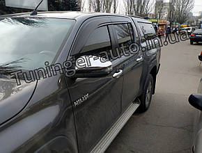 Дефлектори вікон (вітровики) Toyota Hilux 2015-2023 (Hic)