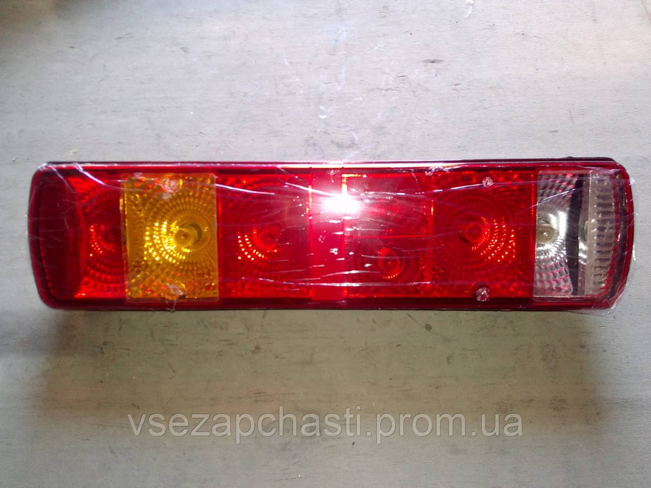 Ліхтар задній лівий WG9719810001 HOWO