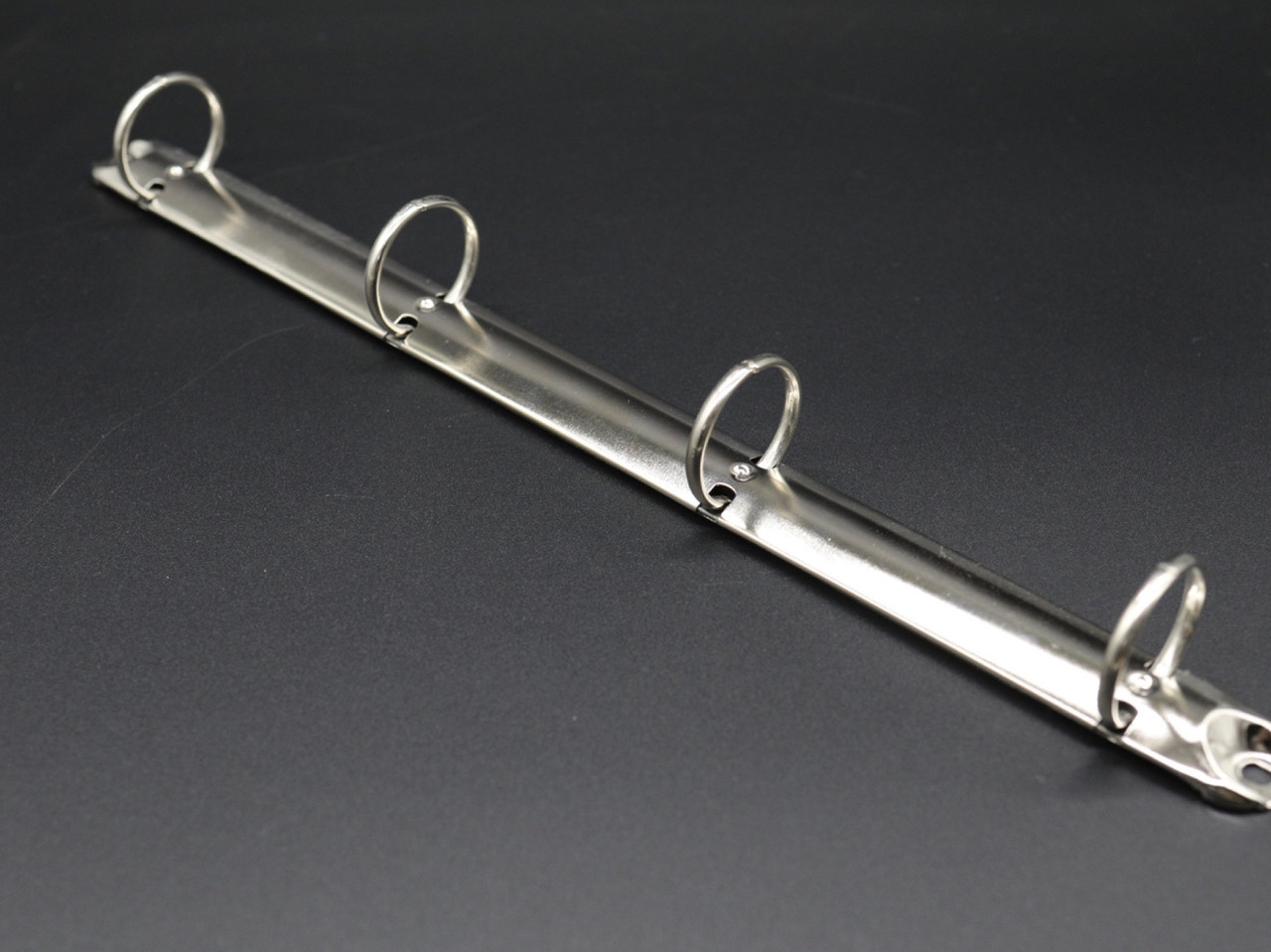 Затискачі канцелярські для блокнотів і паперу. 290х21мм. Кільце 30мм, фото 1