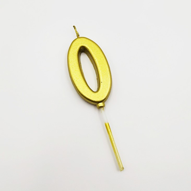 Свічка цифра "0" в торт з позолотою