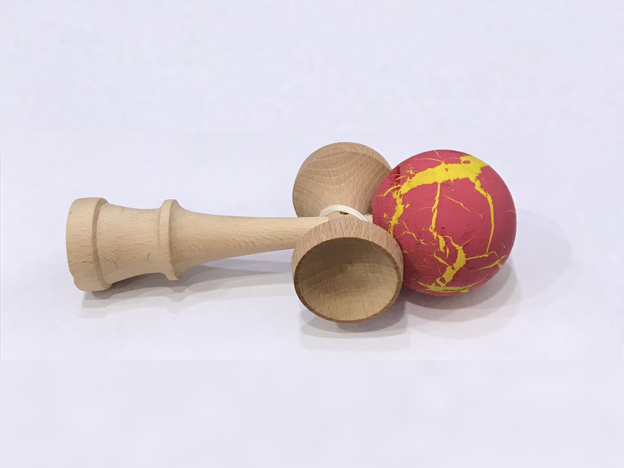 Іграшка KENDAMA (КЕНДАМА) BERYOU OOTDTY (жовто-малинова кулька) дерев'яна 18 см