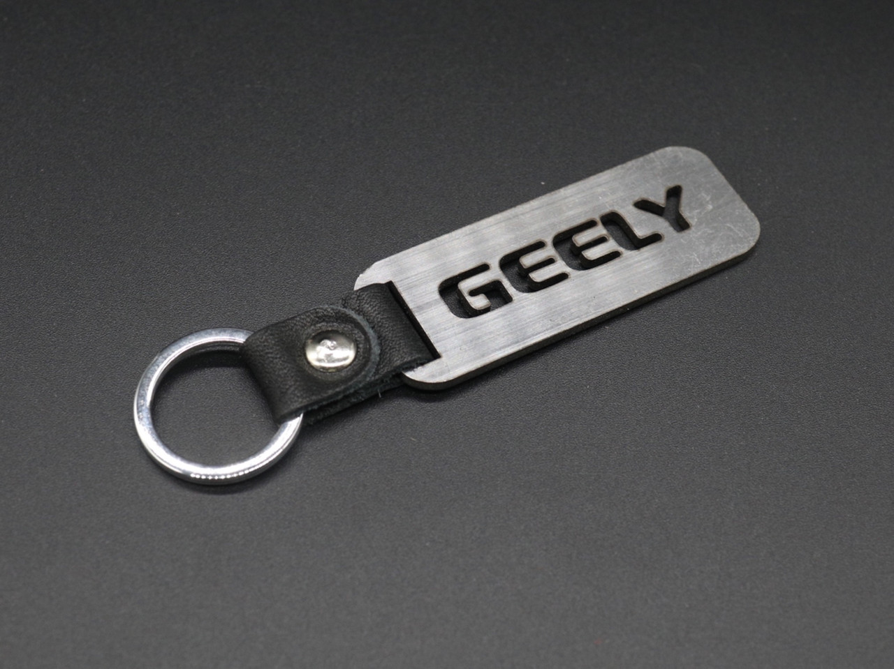 Брелок металевий. Geely. 10х2,5см, фото 1