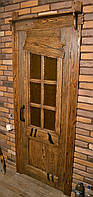 Двери межкомнатные деревянные со стеклом и ковкой