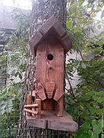 Шпаківня з годівницею