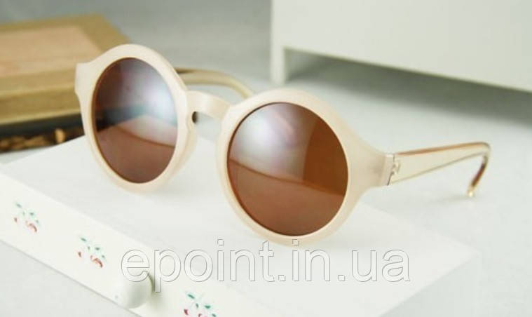 Сонцезахисні круглі окуляри, оправа однорідної фактури, душки з прозорого пластику світло-бежевого кольору, фото 1