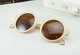 Сонцезахисні круглі окуляри, оправа однорідної фактури, душки з прозорого пластику світло-бежевого кольору, фото 2
