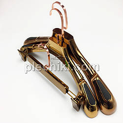 Набір пластикових вішалок для одягу в кольорі коричневе золото 3 шт.