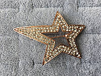 Брошка металева на золотистій основі зірочка з білими кристалами розмір виробу 40х45 мм