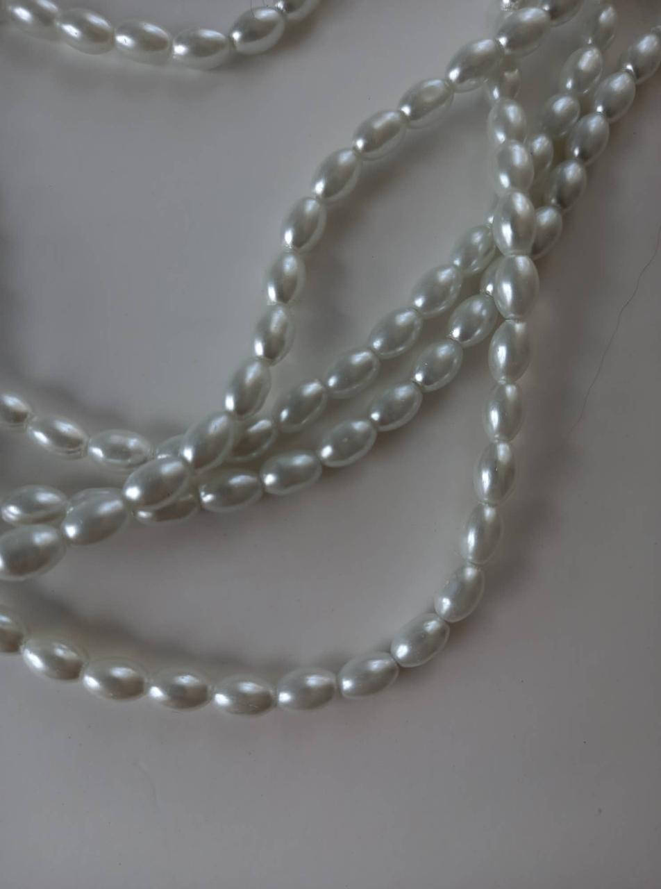 

Бусины под жемчуг рис, 7\5 мм, нить, Белый