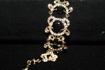 Розкішний браслет золотистий з чорними каменями гірський кришталь