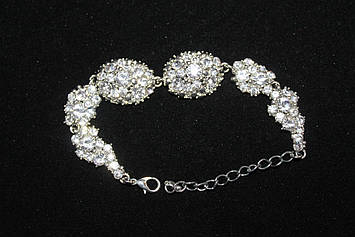 Шикарний вечірній сріблястий браслет з камінням гірський кришталь