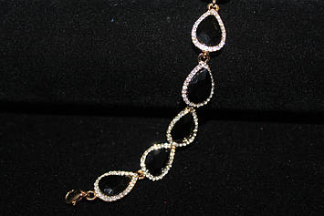 Ніжний браслет золотистий з чорними каменями гірський кришталь