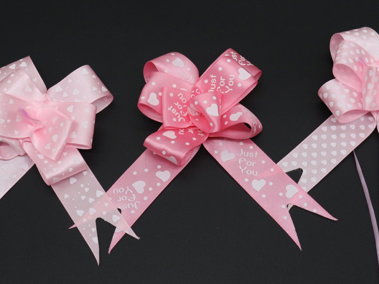 Бант-затяжка подарунковий для упаковки з поліпропіленової стрічки Колір рожевий. 5х8 см, фото 1