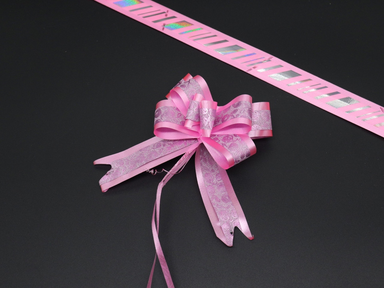 Подарунковий бант красивий на затяжках зі стрічки для декору та упаковки Колір світло-рожевий. 4х9 см