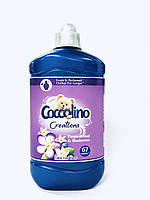 Ополіскувач-кондиціонер для білизни Coccolino Purple Orchid & Blueberries 1450 мл