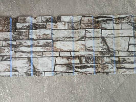 Профнастил з малюнком під камінь.