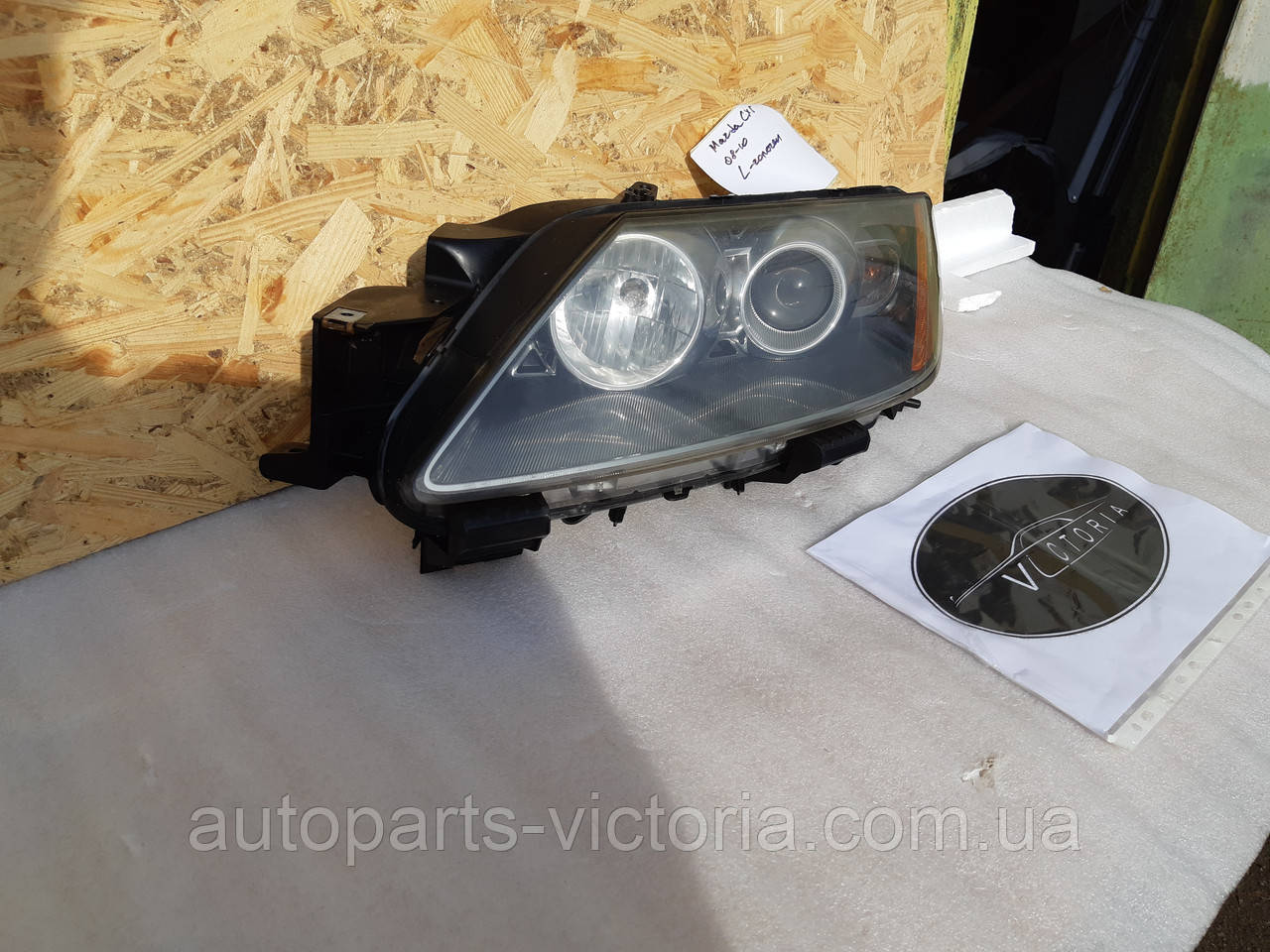 Фара ліва Mazda CX7 галоген 08-10 США вживана