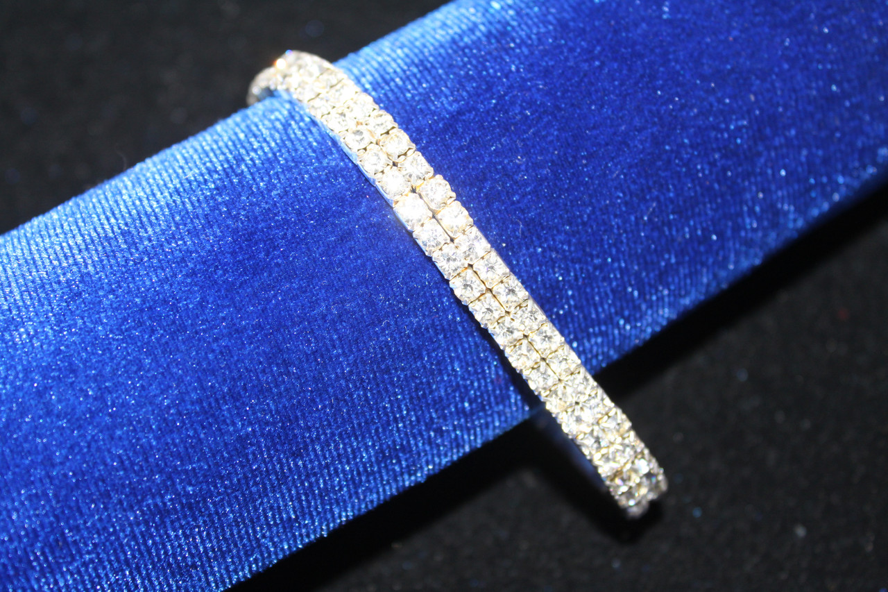 Замечательный двойной браслет с камнями серебристый на резинке, фото 1