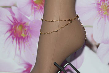 Чудовий браслет на ногу два ланцюжки з золотистими намистинами