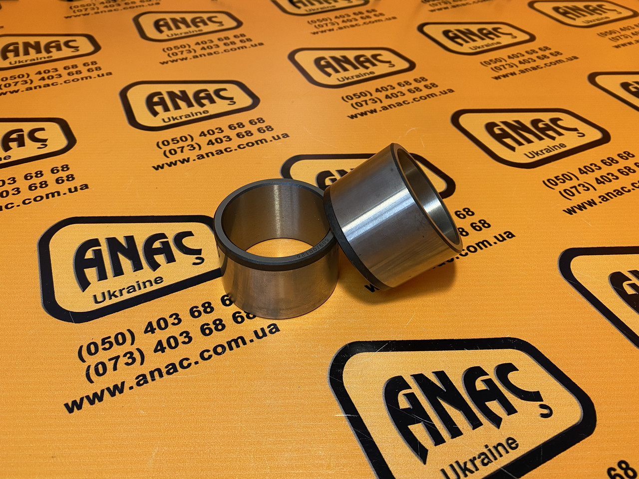 809/00126, 808/00361 Втулка гідроциліндра (50x60x40) на JCB 3CX, 4CX, фото 1