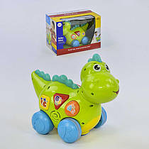Іграшка Динозавр 6105 (18) їздить, говорить англійською мовою, програє мелодії і звуки, з підступах д