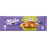 Milka молочна з цілим лісовим горіхом 270 г