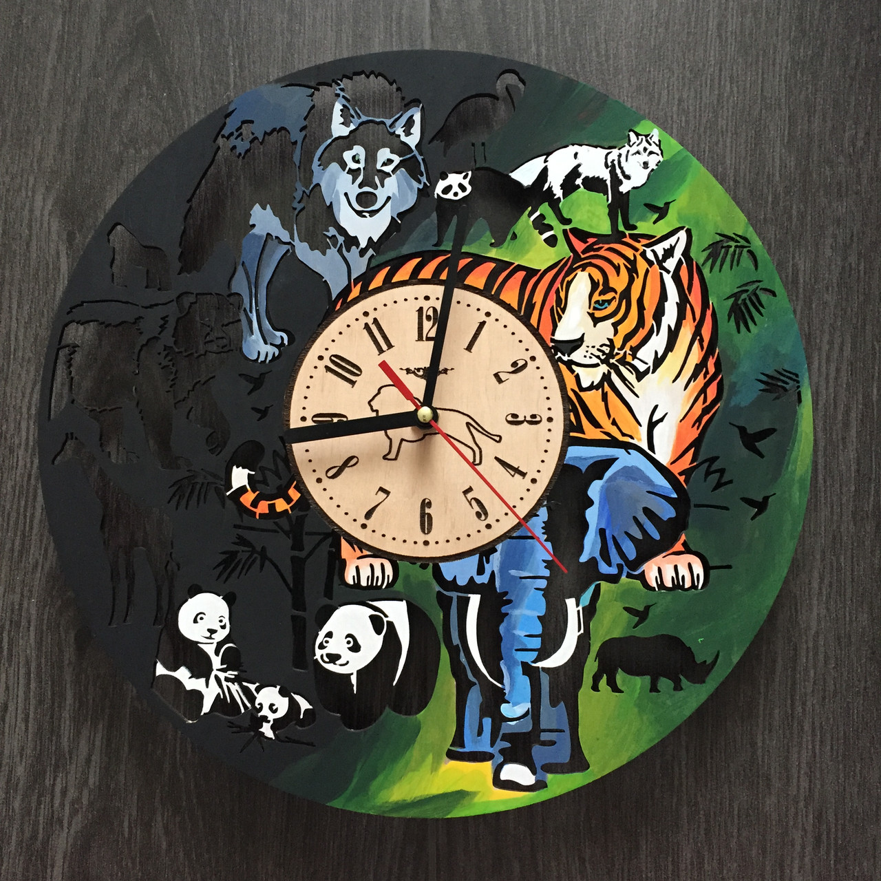 Великий круглий кольоровий настінний годинник «Джунглі»
