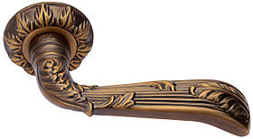 Ручка дверна на розетці SIBA Karina, фактурна бронза