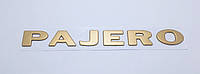 Емблема напис багажника Mitsubishi Pajero золотистий