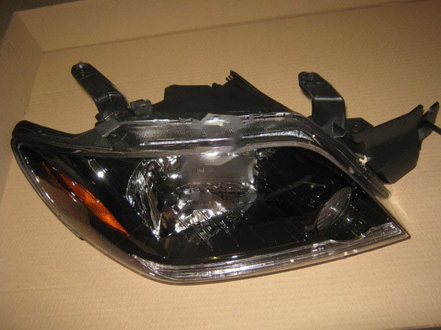 Фара правая MITSUBISHI OUTLANDER -07 (TEMPEST). 036 0360 R2C