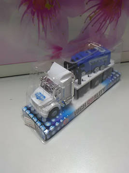 Машина камаз з маленькою машинкою