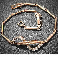 Браслет ХР. Позолота ЧВ. Камені: білий циркон. Довжина: 17-20 см. Ширина: 10 мм.