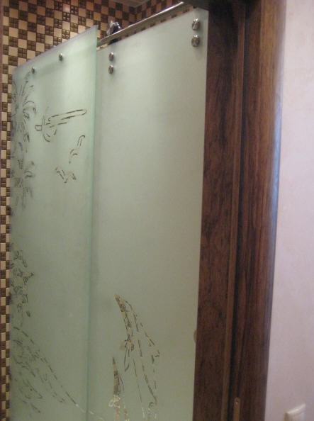 Розсувні двері скляні для душової