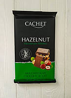 Шоколад молочний з фундуком Cachet Milk Chocolate Hazelnut 300г (Бельгія)