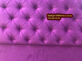 Виголов'я ліжка з ґудзиками