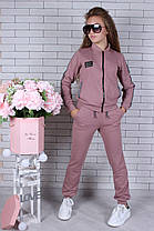 Спортивний костюм комплект на дівчинку-трійка (кофта, штани, спідниця) 146