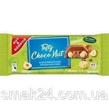 Шоколад молочний з цільним лісовим горіхом Edeka Tasty Choco Nut Crunchy Німеччина 200г