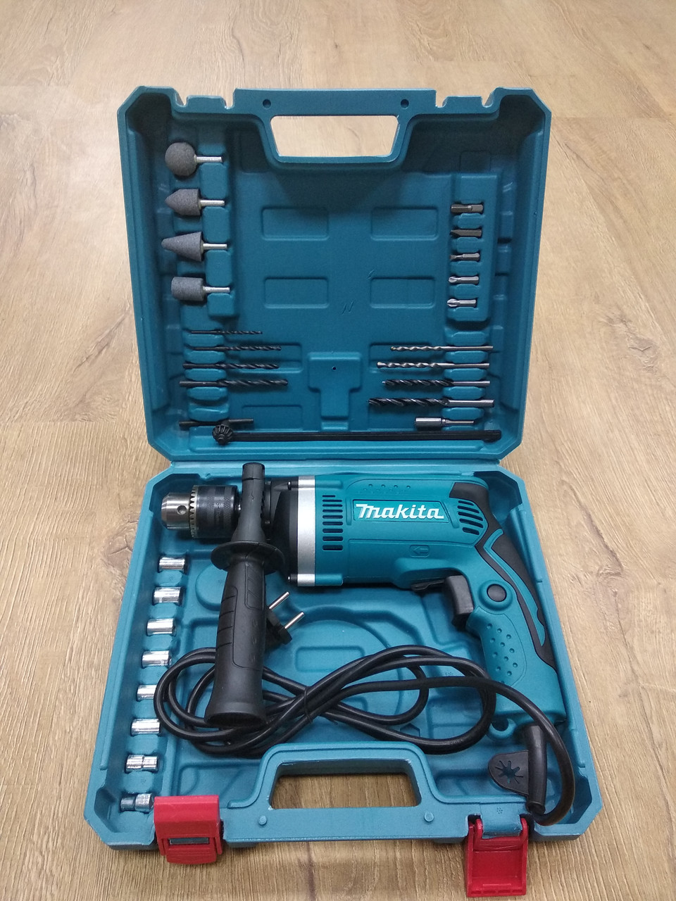 Дриль ударний Makita HP1630 : 710 Вт | У комплекті - Штани, Головки, Біти, Точильні камені