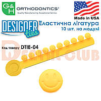 Дизайнерська еластична лігатура 10 шт. на модулі DesignerTies® (G&H Orthodontics) США, без латексу картинка - Жовтий смайлик ( Smiley Face Yellow DTIE-04 )