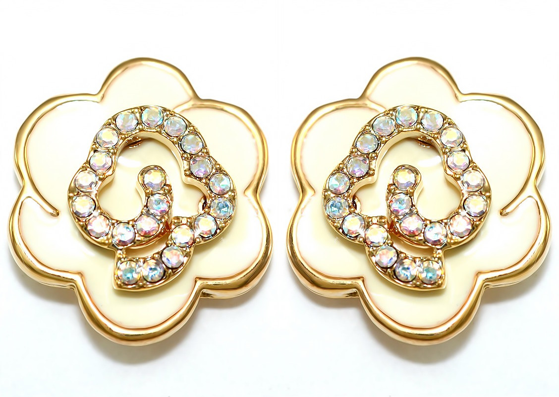 Сережки гвоздики. Оправа кольору позолота. Камені: бензиновий циркон. Діаметр: 17 мм.