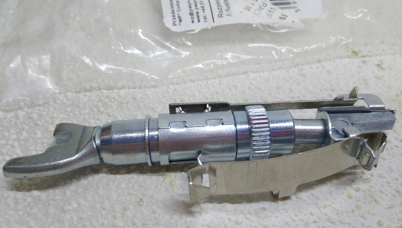 Распорная планка задних барабанных колодок ручника Фиат Добло, Пунто ...