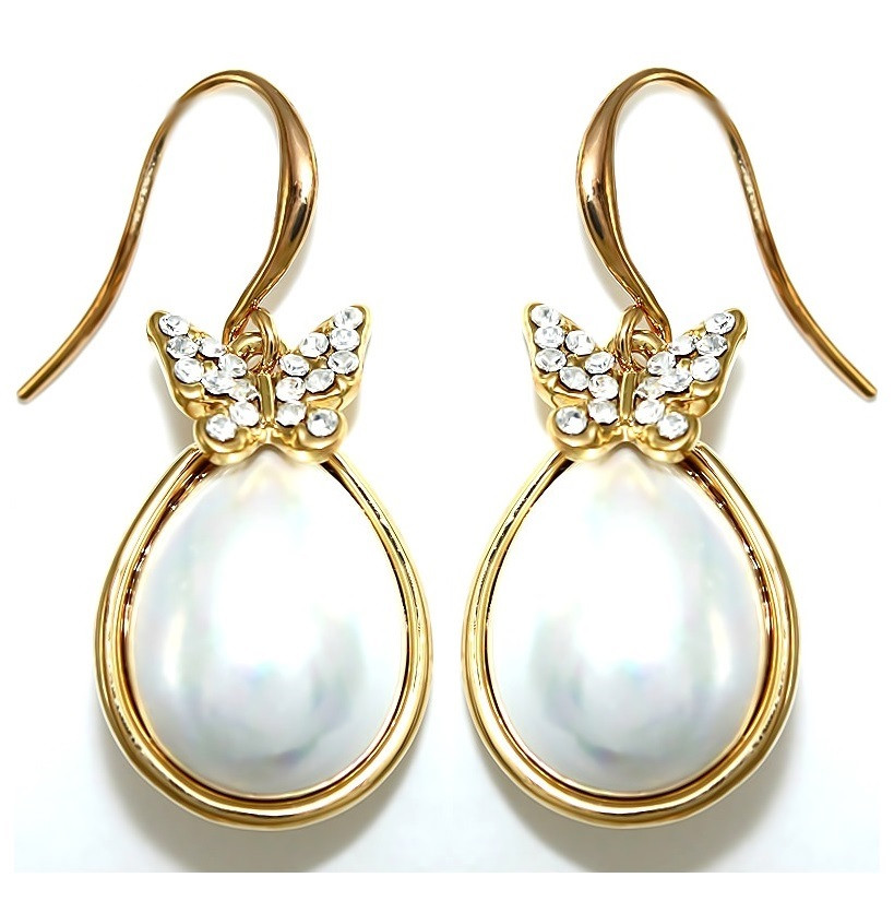 Сережки Fashion. Колір оправи: позолота. Камені: білий циркон і перли. Довжина сережки: 3.5 см. Ширина: 15 мм.