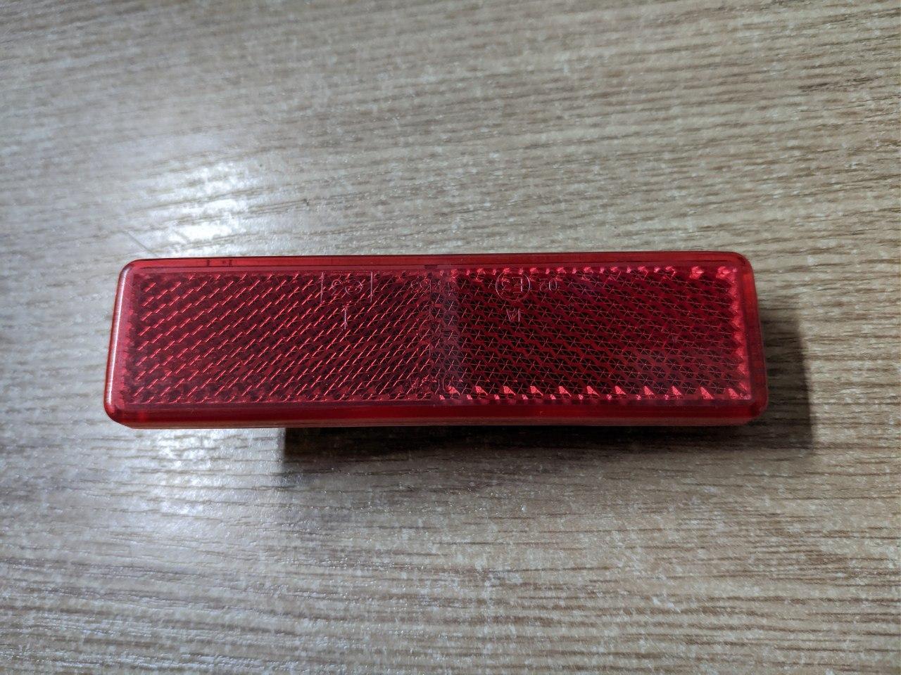 Катафот заднього бампера Renault Trafic, Opel Vivaro 2001-2014, 7700353184 (Б/У)