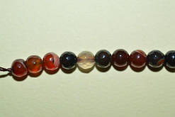 Бусини із сердолику 60 шт 6 мм з огранкою