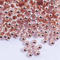 Бусини роздільники 8,5х2,5 мм 50 шт сніжинки метал рожеве золото